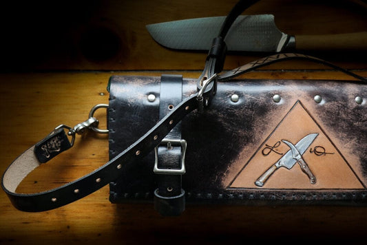 Custom Leather Knife Roll with crossing knives and Roman Numeral handle